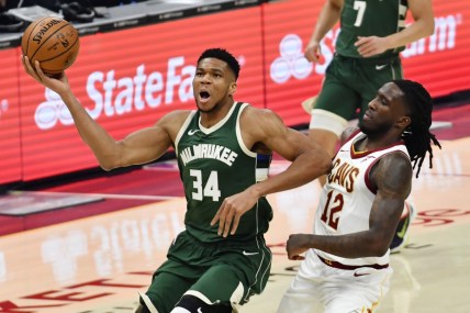 Feb 6, 2021; Cleveland, Ohio, USA; Milwaukee Bucks forward Giannis Antetokounmpo (34) drives to the basket against Cleveland Cavaliers forward Taurean Prince (12) during the second quarter at Rocket Mortgage FieldHouse. Mandatory Credit: Ken Blaze-USA TODAY Sports