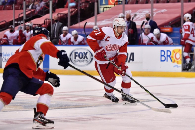 Feb 7, 2021; Sunrise, Florida, USA; Detroit Red Wings center Dylan Larkin (71) skates with the puck against the Florida Panthers during the first period at BB&T Center. Mandatory Credit: Jasen Vinlove-USA TODAY Sports