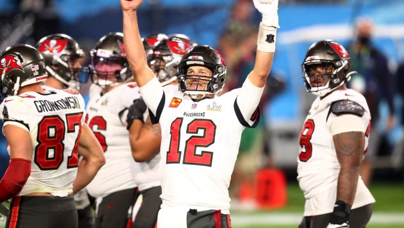 Feb 7, 2021; Tampa, FL, USA;  Tampa Bay Buccaneers quarterback Tom Brady (12) celebrates during the fourth quarter against the Kansas City Chiefs in Super Bowl LV at Raymond James Stadium.  Mandatory Credit: Mark J. Rebilas-USA TODAY Sports