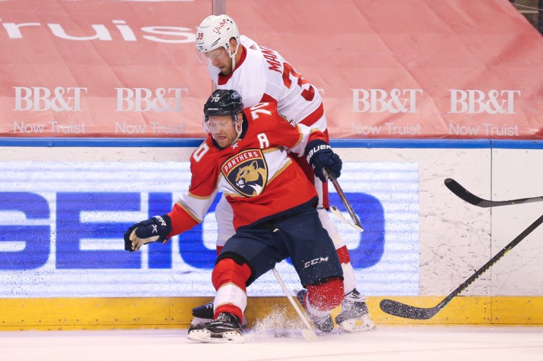 Feb 9, 2021; Sunrise, Florida, USA; Florida Panthers right wing Patric Hornqvist (70) battles against Detroit Red Wings right wing Anthony Mantha (39) during the first period at BB&T Center. Mandatory Credit: Sam Navarro-USA TODAY Sports