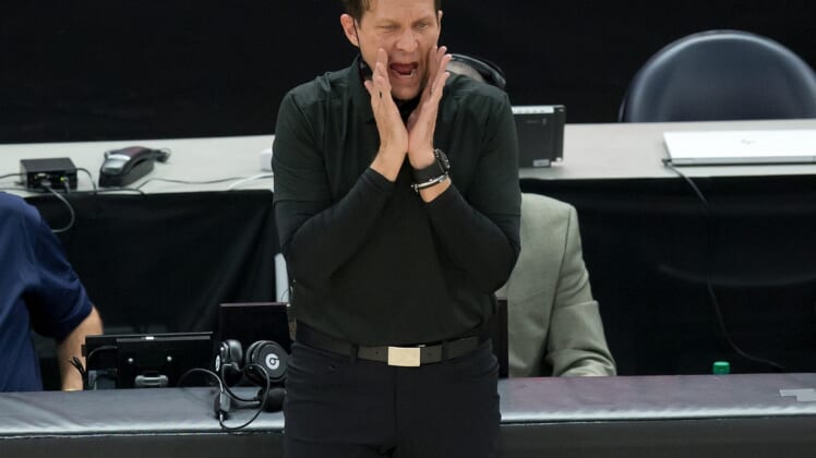 Feb 9, 2021; Salt Lake City, Utah, USA; Utah Jazz head coach Quin Snyder yells to his players during the first quarter against the Boston Celtics at Vivint Smart Home Arena. Mandatory Credit: Russell Isabella-USA TODAY Sports