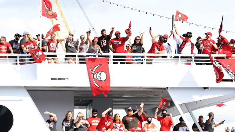 Feb 10, 2021; Tampa Bay, Florida, USA;   Tampa Bay Buccaneers celebrate during the  Tampa Bay Buccaneers boat parade to celebrate their victory over the Kansas City Chiefs in Super Bowl LV. Mandatory Credit: Jonathan Dyer-USA TODAY Sports