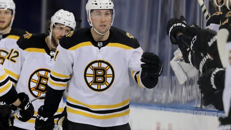 Feb 12, 2021; New York, New York, USA; Boston Bruins left wing Nick Ritchie (21) celebrates with teammates on the bench after scoring a goal against the New York Rangers in the second period at Madison Square Garden. Mandatory Credit: Elsa/Pool Photos-USA TODAY Sports