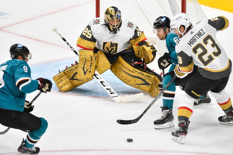 Feb 13, 2021; San Jose, California, USA; Vegas Golden Knights goaltender Marc-Andre Fleury (29) defends his net against the San Jose Sharks in the first period at SAP Center at San Jose. Mandatory Credit: Chris Brown-USA TODAY Sports
