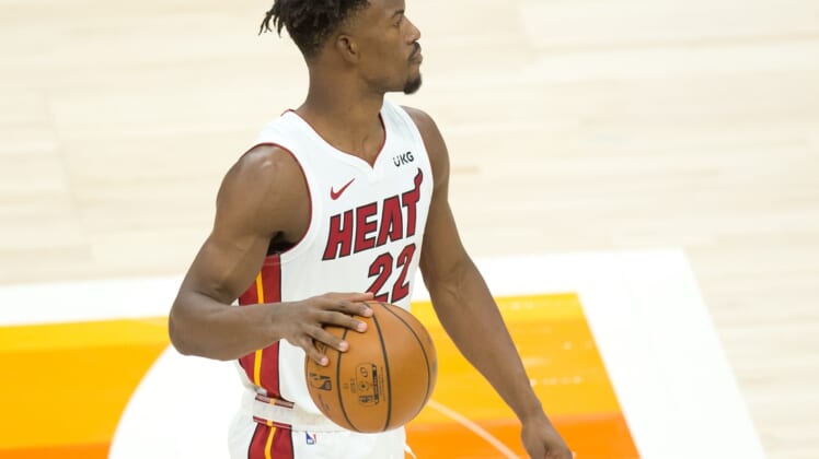 Feb 13, 2021; Salt Lake City, Utah, USA; Miami Heat forward Jimmy Butler (22) dribbles the ball against the Utah Jazz during the first quarter at Vivint Smart Home Arena. Mandatory Credit: Russell Isabella-USA TODAY Sports