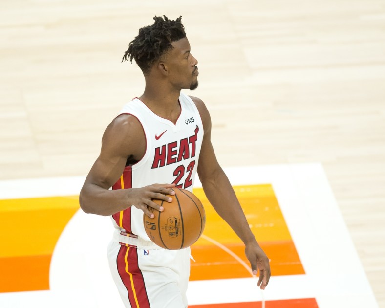 Feb 13, 2021; Salt Lake City, Utah, USA; Miami Heat forward Jimmy Butler (22) dribbles the ball against the Utah Jazz during the first quarter at Vivint Smart Home Arena. Mandatory Credit: Russell Isabella-USA TODAY Sports