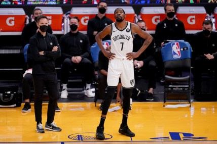 Feb 13, 2021; San Francisco, California, USA; Brooklyn Nets forward Kevin Durant (7) stands next to head coach Steve Nash after exiting a game against the Golden State Warriors in the third quarter at the Chase Center. Mandatory Credit: Cary Edmondson-USA TODAY Sports