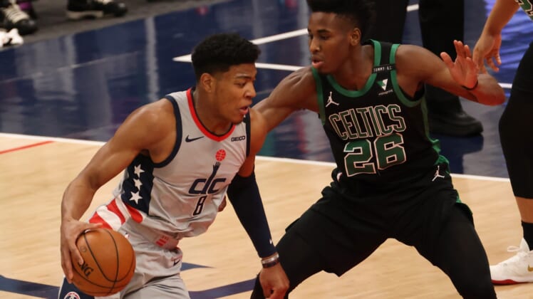 Feb 14, 2021; Washington, District of Columbia, USA; Washington Wizards forward Rui Hachimura (8) drives to the basket as Boston Celtics forward Aaron Nesmith (26) defends in the first quarter at Capital One Arena. Mandatory Credit: Geoff Burke-USA TODAY Sports