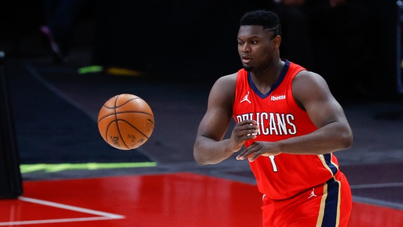 Feb 14, 2021; Detroit, Michigan, USA;  New Orleans Pelicans forward Zion Williamson (1) passes in the first half against the Detroit Pistons at Little Caesars Arena. Mandatory Credit: Rick Osentoski-USA TODAY Sports