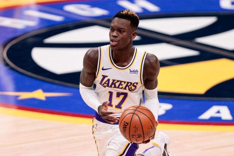 Feb 14, 2021; Denver, Colorado, USA; Los Angeles Lakers guard Dennis Schroder (17) controls the ball in the fourth quarter against the Denver Nuggets at Ball Arena. Mandatory Credit: Isaiah J. Downing-USA TODAY Sports