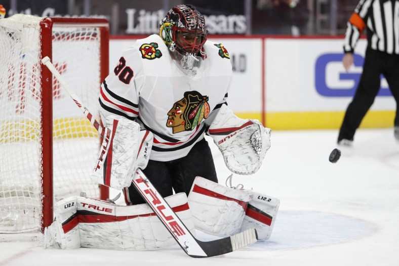 Feb 15, 2021; Detroit, Michigan, USA; Chicago Blackhawks goaltender Malcolm Subban (30) makes a save during the second period against the Detroit Red Wings at Little Caesars Arena. Mandatory Credit: Raj Mehta-USA TODAY Sports