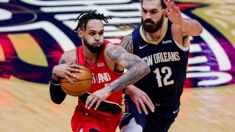 Feb 17, 2021; New Orleans, Louisiana, USA;  Portland Trail Blazers guard Gary Trent Jr. (2) moves to the basket against New Orleans Pelicans center Steven Adams (12)  during the first half at the Smoothie King Center. Mandatory Credit: Stephen Lew-USA TODAY Sports