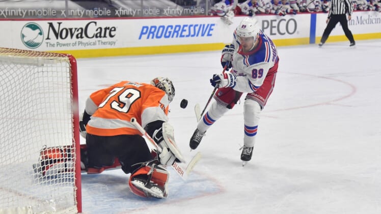 Feb 18, 2021; Philadelphia, Pennsylvania, USA; Philadelphia Flyers goaltender Carter Hart (79) makes a save against New York Rangers right wing Pavel Buchnevich (89) on a penalty shot during the second period at Wells Fargo Center. Mandatory Credit: Eric Hartline-USA TODAY Sports