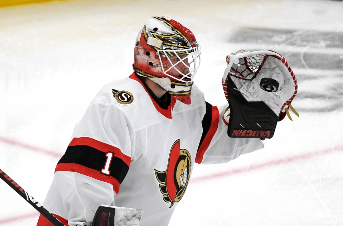 Feb 18, 2021; Toronto, Ontario, CAN;  Ottawa Senators goalie Marcus Hogberg (1) warms up before playing Toronto Maple Leafs at Scotiabank Arena. Mandatory Credit: Dan Hamilton-USA TODAY Sports