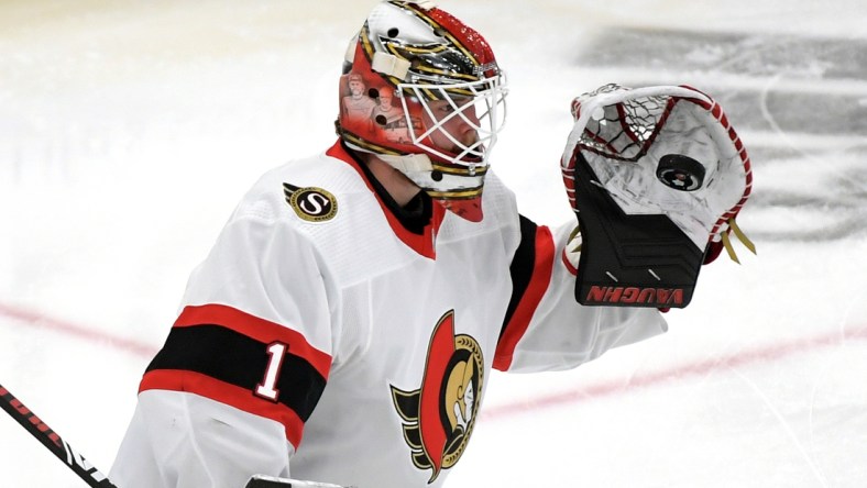 Feb 18, 2021; Toronto, Ontario, CAN;  Ottawa Senators goalie Marcus Hogberg (1) warms up before playing Toronto Maple Leafs at Scotiabank Arena. Mandatory Credit: Dan Hamilton-USA TODAY Sports