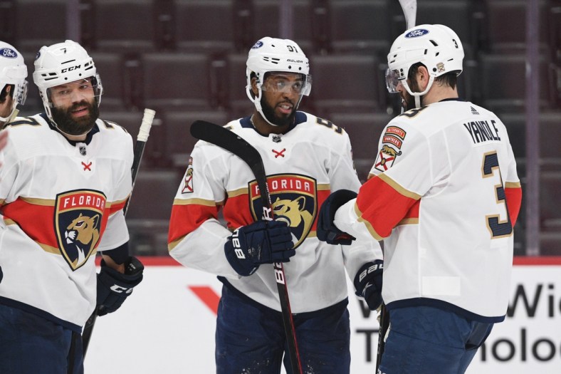 Feb 19, 2021; Detroit, Michigan, USA; Florida Panthers left wing Anthony Duclair (91) celebrates his goal with teammates during the third period against the Detroit Red Wings at Little Caesars Arena. Mandatory Credit: Tim Fuller-USA TODAY Sports