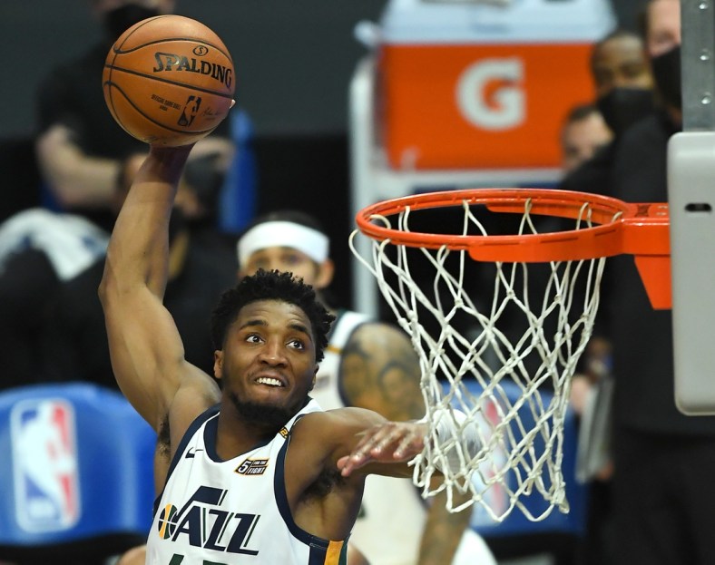 Feb 19, 2021; Los Angeles, California, USA; Utah Jazz guard Donovan Mitchell (45) goes up for a dunk in the second half of the game against the Los Angeles Clippers at Staples Center. Mandatory Credit: Jayne Kamin-Oncea-USA TODAY Sports