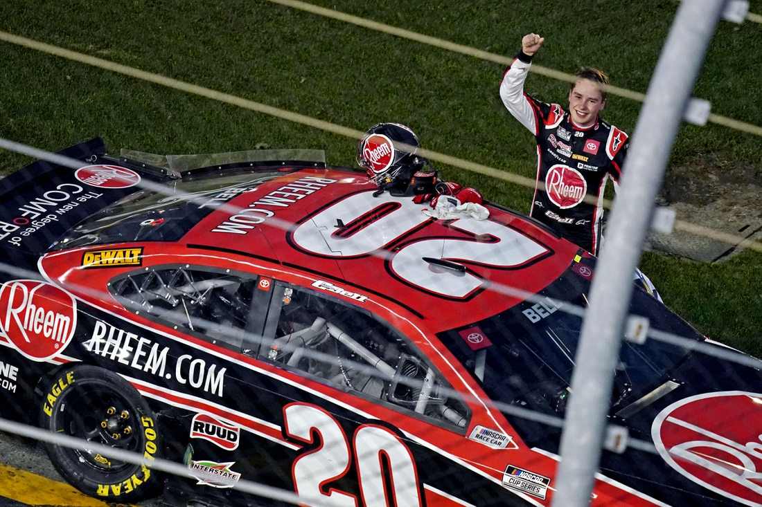 Feb 21, 2021; Daytona Beach, Florida, USA; NASCAR Cup Series driver Christopher Bell (20) celebrates winning the O'Reilly Auto Parts 253 at Daytona International Speedway. Mandatory Credit: Jasen Vinlove-USA TODAY Sports