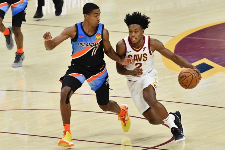 Feb 21, 2021; Cleveland, Ohio, USA; Cleveland Cavaliers guard Collin Sexton (2) drives to the basket against Oklahoma City Thunder guard Theo Maledon (11) during the second quarter at Rocket Mortgage FieldHouse. Mandatory Credit: Ken Blaze-USA TODAY Sports