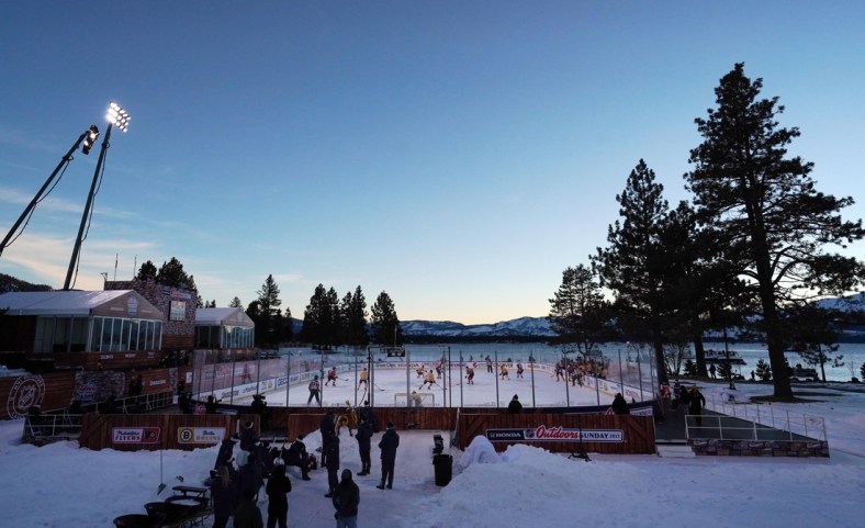 Feb 21, 2021; Stateline, Nevada, USA; A general view as the sun sets during the first period in a NHL Outdoors hockey game between the Philadelphia Flyers and the Boston Bruins at Lake Tahoe. Mandatory Credit: Kirby Lee-USA TODAY Sports