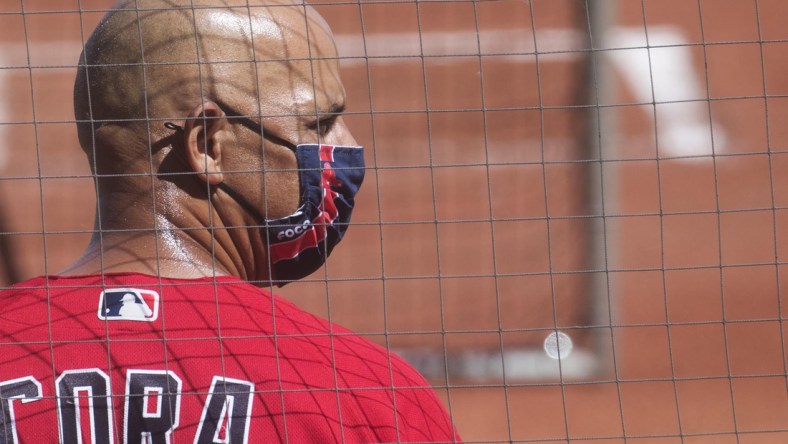 Feb 22, 2021; Fort Myers, FL, USA; Boston Red Sox manager Alex Cora watches batting practice at Jet Blue Park in Fort Myers on Monday, February 22, 2021. It was the first full squad spring training workout.  Mandatory Credit: Andrew West/The News-Press-USA TODAY Sports