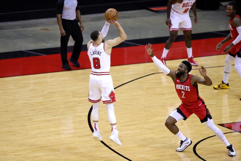 Feb 22, 2021; Houston, Texas, USA; Zach LaVine #8 of the Chicago Bulls shoots a basket ahead of David Nwaba #2 of the Houston Rockets during the second quarter at Toyota Center. Mandatory Credit: Carmen Mandato/Pool Photo-USA TODAY Sports