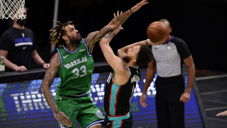 Feb 22, 2021; Dallas, Texas, USA; Dallas Mavericks center Willie Cauley-Stein (33) block a shot by Memphis Grizzlies forward Kyle Anderson (1) during the second quarter at the American Airlines Center. Mandatory Credit: Jerome Miron-USA TODAY Sports