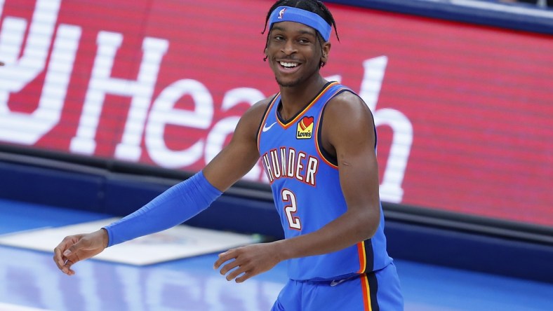 Feb 22, 2021; Oklahoma City, Oklahoma, USA; Oklahoma City Thunder guard Shai Gilgeous-Alexander (2) reacts after a shot against the Miami Heat during the first quarter at Chesapeake Energy Arena. Mandatory Credit: Alonzo Adams-USA TODAY Sports