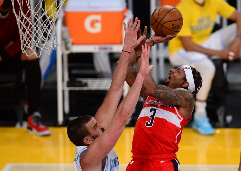 Feb 22, 2021; Los Angeles, California, USA; Washington Wizards guard Bradley Beal (3) shoots against Los Angeles Lakers center Marc Gasol (14) during the second half at Staples Center. Mandatory Credit: Gary A. Vasquez-USA TODAY Sports
