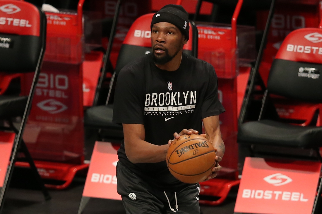Feb 23, 2021; Brooklyn, New York, USA; Brooklyn Nets power forward Kevin Durant (7) warms up before a game against the Sacramento Kings at Barclays Center. Mandatory Credit: Brad Penner-USA TODAY Sports