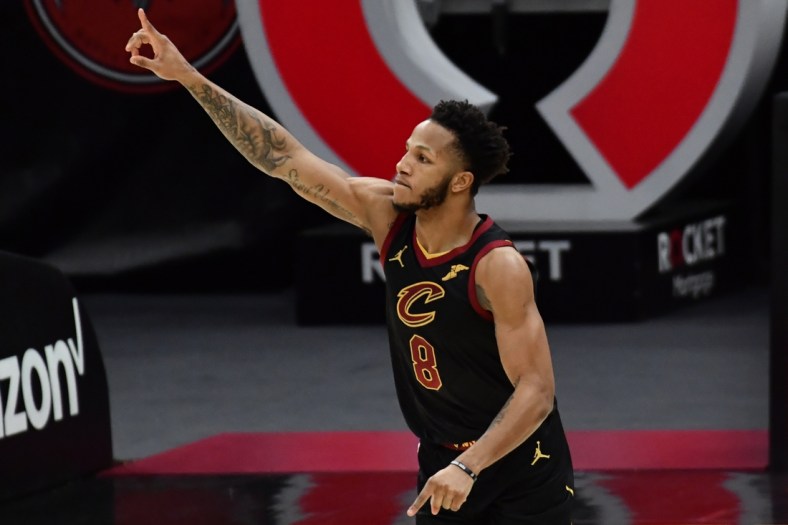 Feb 23, 2021; Cleveland, Ohio, USA; Cleveland Cavaliers forward Lamar Stevens (8) celebrates after scoring  the go-ahead points during the fourth quarter against the Atlanta Hawks at Rocket Mortgage FieldHouse. Mandatory Credit: Ken Blaze-USA TODAY Sports