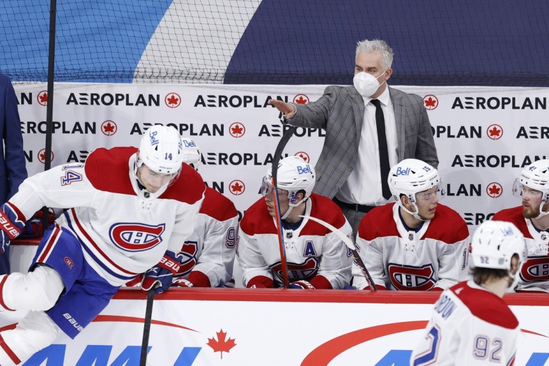 Feb 25, 2021; Winnipeg, Manitoba, CAN;  Canadiens  Montreal Canadiens Interim Head Coach Dominique Ducharme signals to a player during the first period against the Winnipeg Jets at Bell MTS Place. Mandatory Credit: James Carey Lauder-USA TODAY Sports