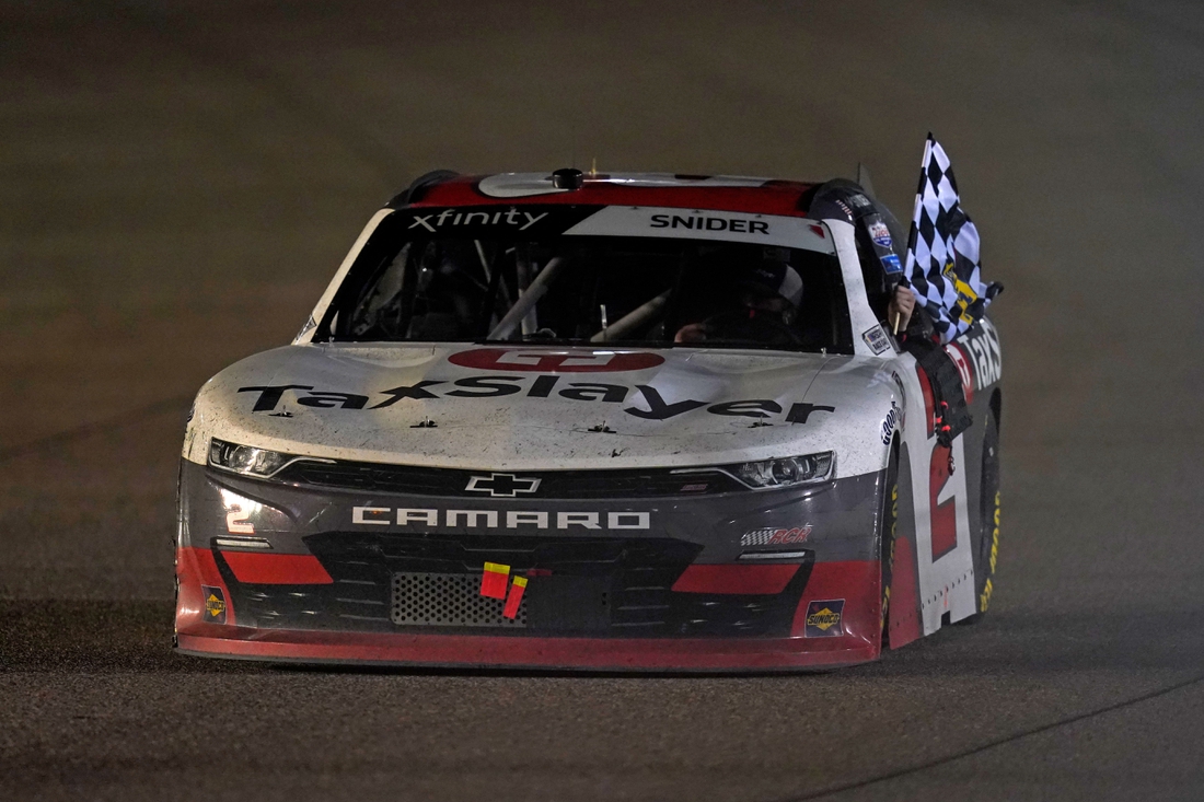 Feb 27, 2021; Miami, FL, USA; NASCAR Xfinity Series driver Myatt Snider (2) does a victory lap after winning the Contender Boats 250 at Homestead-Miami Speedway. Mandatory Credit: Jasen Vinlove-USA TODAY Sports