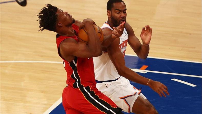 Feb 7, 2021; New York, New York, USA; Austin Rivers #8 of the New York Knicks defends against Jimmy Butler #22 of the Miami Heat at Madison Square Garden on February 07, 2021 in New York City. Mandatory Credit: Mike Stobe/Pool Photo-USA TODAY Sports