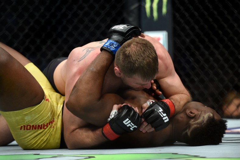 Jan 20, 2018; Boston, MA, USA; Stipe Miocic (red gloves) fights Francis Ngannou (blue gloves) during UFC 220 at the TD Garden. Mandatory Credit: Bob DeChiara-USA TODAY Sports