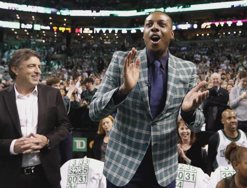 Feb 11, 2018; Boston, MA, USA; Former Boston Celtics forward Paul Pierce cheers as team owner Wyc Grousbeck  looks on during the first quarter against the Cleveland Cavaliers at TD Garden. Mandatory Credit: Winslow Townson-USA TODAY Sports