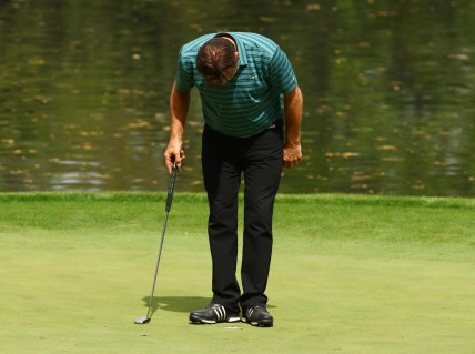 Apr 4, 2018; Augusta, GA, USA; Nick Faldo takes a bow on the 9th green during the Par 3 Contest before the Masters golf tournament at Augusta National Golf Club. Mandatory Credit: Rob Schumacher-USA TODAY Sports