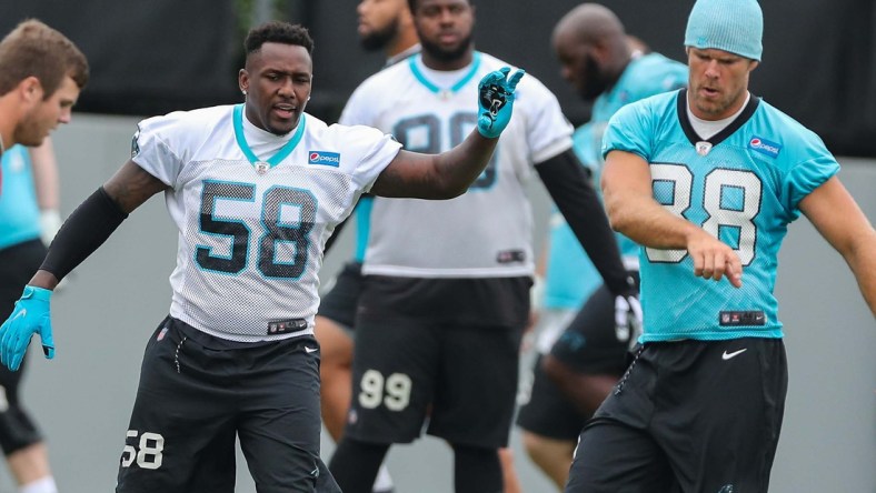 Jun 12, 2018; Charlotte, NC, USA; Carolina Panthers linebacker Thomas Davis (58) and tight end Greg Olsen (88) drill during mini-camp at Carolina Panthers practice field next to Bank of America Stadium. Mandatory Credit: Jim Dedmon-USA TODAY Sports