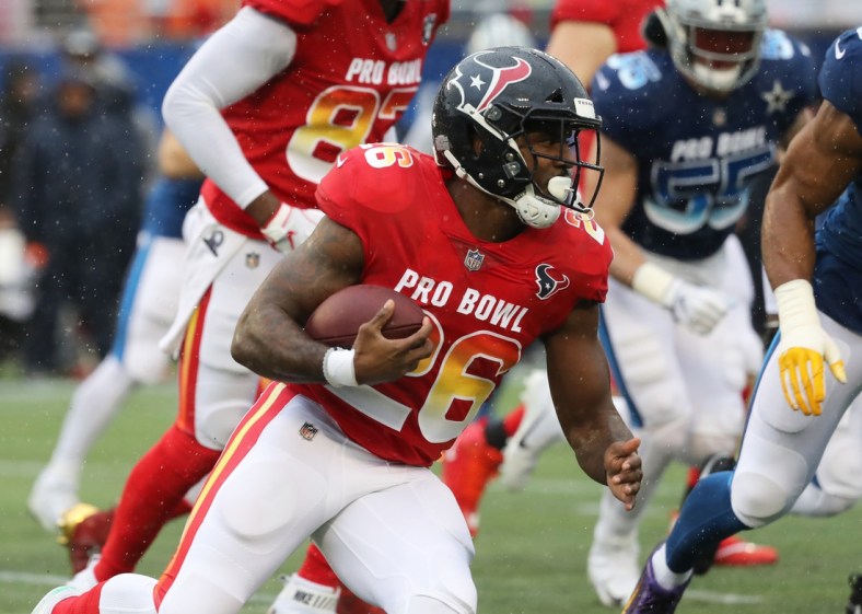 Jan 27, 2019; Orlando, FL, USA; AFC running back Lamar Miller (26) runs with the ball during the first half in the NFL Pro Bowl football game at Camping World Stadium. Mandatory Credit: Kim Klement-USA TODAY Sports