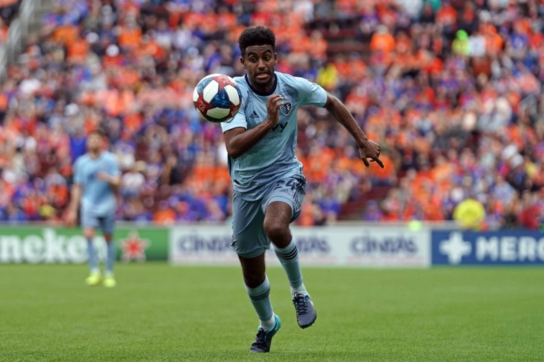 Apr 7, 2019; Cincinnati, OH, USA; Sporting Kansas City midfielder Gedion Zelalem (24) against FC Cincinnati at Nippert Stadium. Mandatory Credit: Aaron Doster-USA TODAY Sports