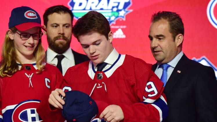 (EDITORS NOTE: caption correction) Jun 21, 2019; Vancouver, BC, Canada; Cole Caufield after being selected as the number fifteen overall pick to the Montreal Canadiens in the first round of the 2019 NHL Draft at Rogers Arena. Mandatory Credit: Anne-Marie Sorvin-USA TODAY Sports