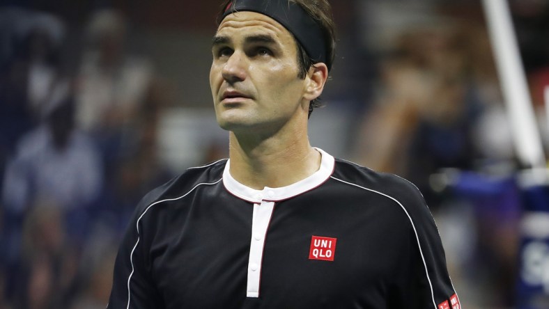 Sep 3, 2019; Flushing, NY, USA; Roger Federer of Switzerland looks at the board between points against Grigor Dimitrov of Bulgaria (not pictured) in a quarterfinal match on day nine of the 2019 US Open tennis tournament at USTA Billie Jean King National Tennis Center. Mandatory Credit: Geoff Burke-USA TODAY Sports