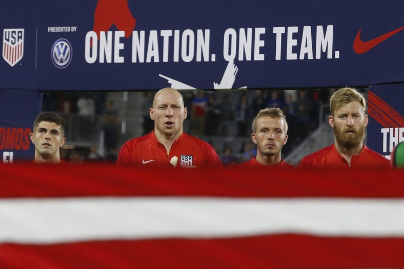 Oct 11, 2019; Washington, DC, USA; (L-R) United States midfielder Christian Pulisic, United States goalkeeper Zack Steffen, United States midfielder Tyler Adams, and United States defender Tim Ream sing the national anthem prior to their match against Cuba in a CONCACAF Nations League soccer match at Audi Field. Mandatory Credit: Geoff Burke-USA TODAY Sports