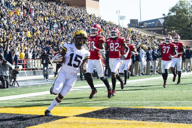Nov 2, 2019; College Park, MD, USA;  Michigan Wolverines wide receiver Giles Jackson (15) returns the opening kick off for a touchdown during the first quarter against the Maryland Terrapins at Capital One Field at Maryland Stadium. Mandatory Credit: Tommy Gilligan-USA TODAY Sports