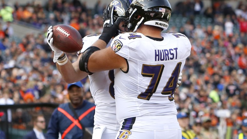 Nov 10, 2019; Cincinnati, OH, USA; Baltimore Ravens tight end Mark Andrews (89) celebrates with offensive tackle James Hurst (74) scoring a touchdown against the Cincinnati Bengals during the first half at Paul Brown Stadium. Mandatory Credit: David Kohl-USA TODAY Sports