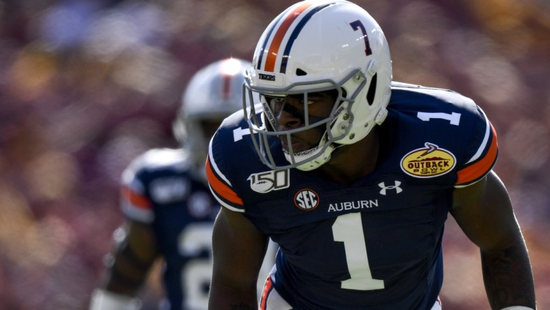 Jan 1, 2020; Tampa, Florida, USA; Auburn Tigers defensive end Big Kat Bryant (1) awaits the snap during the first quarter against the Minnesota Golden Gophers at Raymond James Stadium. Mandatory Credit: Douglas DeFelice-USA TODAY Sports