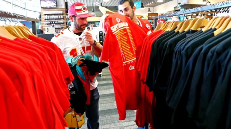 Feb 2, 2020; Miami Gardens, Florida, USA; Fans look throw merchandise before Super Bowl LIV between the San Francisco 49ers and the Kansas City Chiefs at Hard Rock Stadium. Mandatory Credit: Kim Klement-USA TODAY Sports