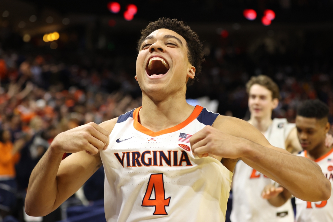 Feb 29, 2020; Charlottesville, Virginia, USA; Virginia Cavaliers forward Justin McKoy (4) celebrates while leaving the court after the Cavaliers  game against the Duke Blue Devils at John Paul Jones Arena. Mandatory Credit: Geoff Burke-USA TODAY Sports