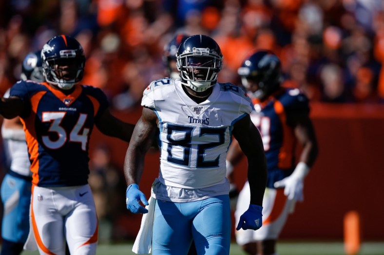Oct 13, 2019; Denver, CO, USA; Tennessee Titans tight end Delanie Walker (82) reacts in the first quarter against the Denver Broncos at Empower Field at Mile High. Mandatory Credit: Isaiah J. Downing-USA TODAY Sports