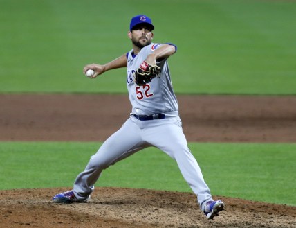 Jul 28, 2020; Cincinnati, Ohio, USA; Chicago Cubs relief pitcher Ryan Tepera (52) throws against the Cincinnati Reds during the ninth inning at Great American Ball Park. Mandatory Credit: David Kohl-USA TODAY Sports